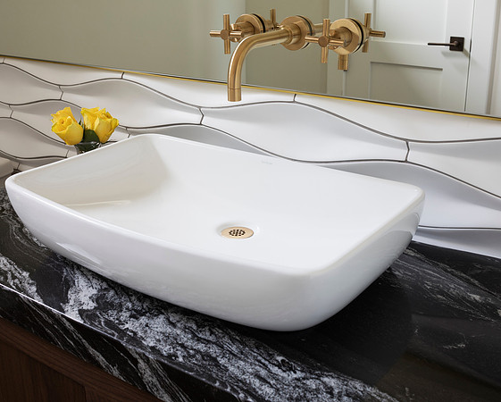 Bathroom vanity with brushed gold wall mount faucet
