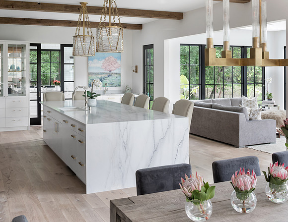 Great room and kitchen with an amazing waterfall island