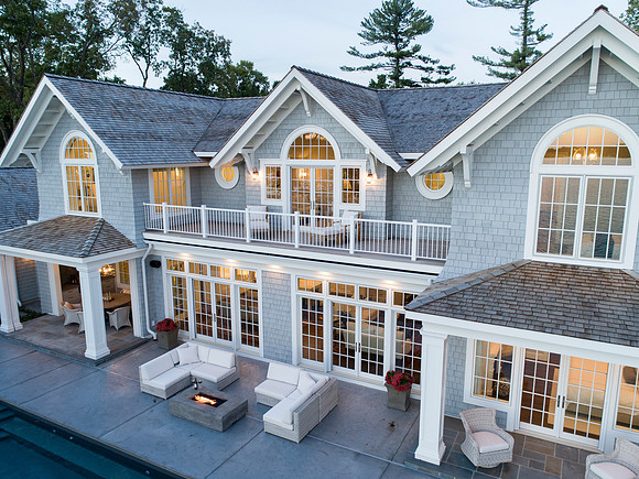 Lake Minnetonka Residence by Swan Architecture, Drone image by Jon Huelskamp LandMark Photography