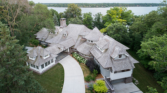 Lake Home by Tea2 Architects, Aerial photo by Jon Huelskamp with LandMark Photography